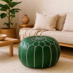 Bright and minimalist living room with a Leather Pouf Green beside a light wooden coffee table and neutral-toned sofa.