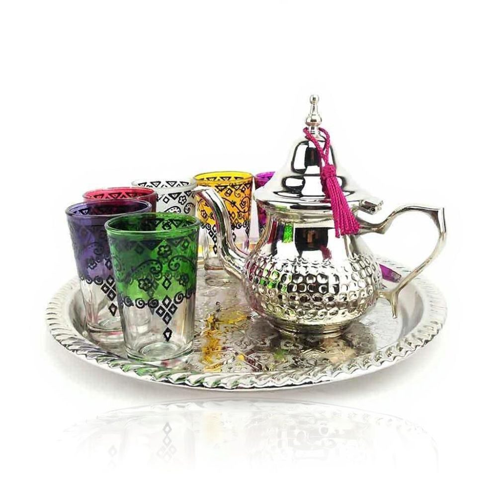 Hand-engraved silver tea set with decorative tray and 6 colorful handblown glass cups on white background