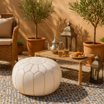 Leather Pouf White on a tiled terrace with Moroccan tea set and pastries.