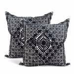 Product photo of black geometric embroidered pillow cover set