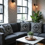 Set of geometric embroidered pillow covers on dark sofa