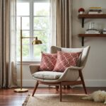 Geometric pillow covers in terracotta on modern armchair, library setting with warm lighting