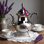 Moroccan silver teapot with lavender and lace setting