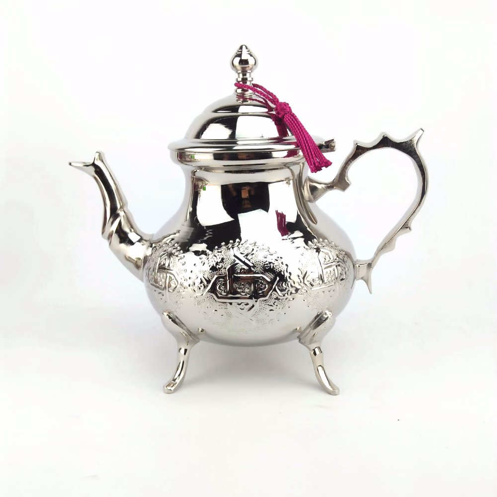Authentic Moroccan silver teapot on white background
