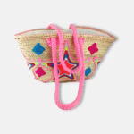 Hand-embroidered straw basket in pink with diamond patterns