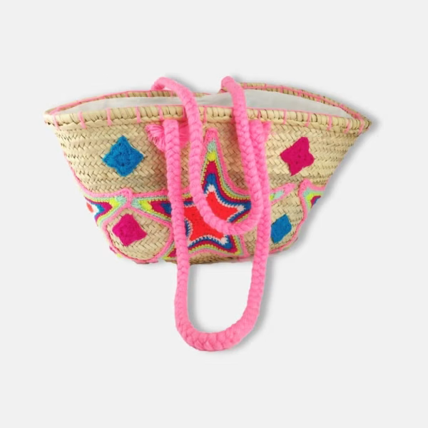 Hand-embroidered straw basket in pink with diamond patterns