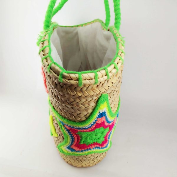 Hand-embroidered straw basket in pink with diamond patterns