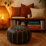 Black leather floor ottoman 21 inch handcrafted pouf with white geometric detail in warm bohemian living room