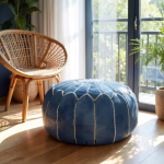 Blue leather pouf in sunlit coastal interior