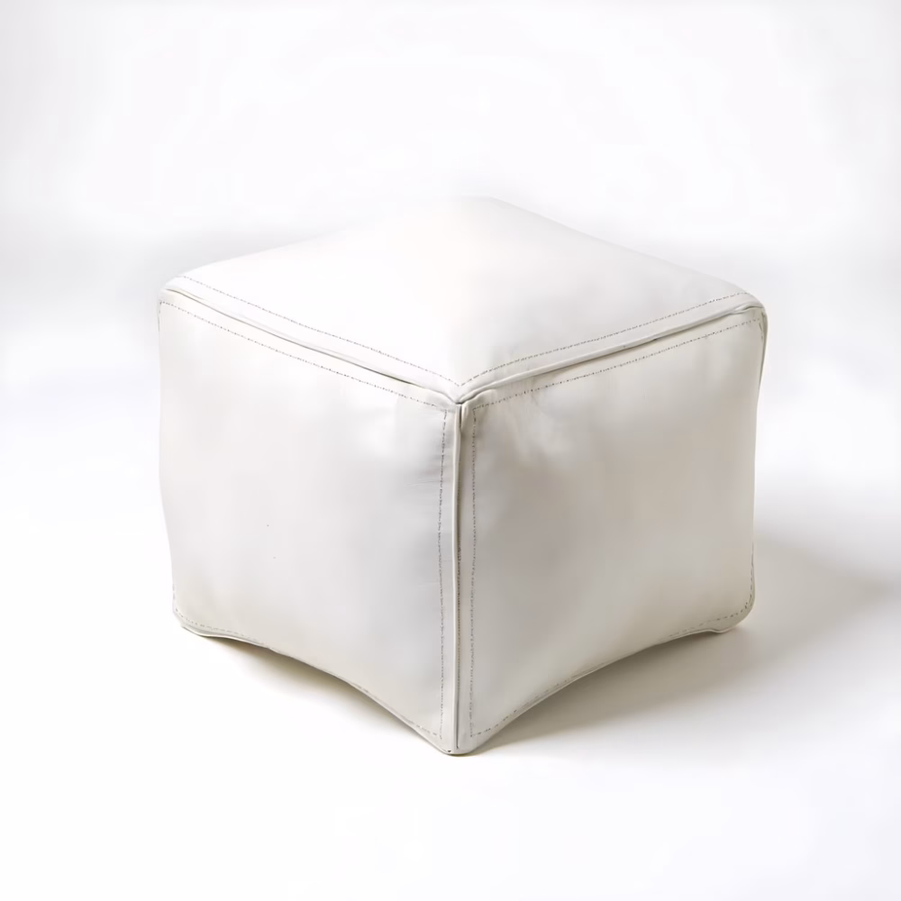 Front view of white square leather pouf