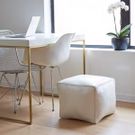 Modern home office with white leather ottoman
