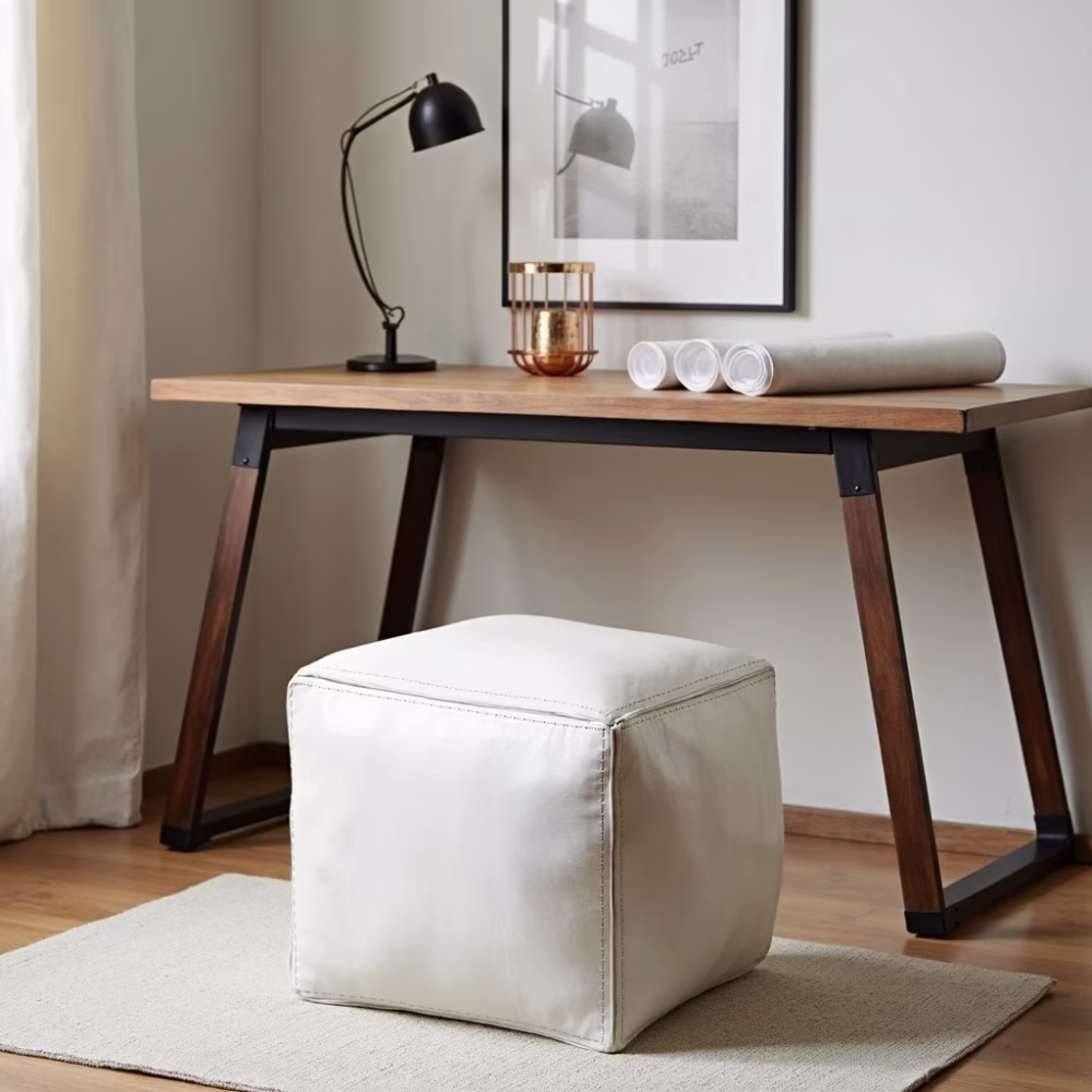 White leather ottoman in workspace setting