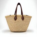 Natural straw tote bag with brown leather handles - handwoven French market basket with herringbone weave