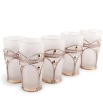 Six white moroccan tea glasses with frosted finish and silver-tone pierced metal filigree holders