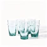 High resolution studio photo of handmade beldi tea glasses set on a white background