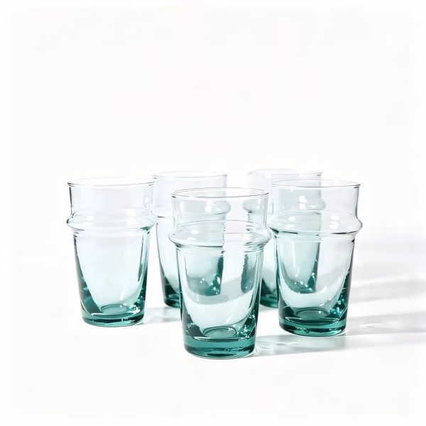 High resolution studio photo of handmade beldi tea glasses set on a white background