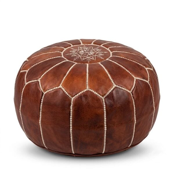 Brown leather round ottoman with embroidered geometric star pattern and hand-stitched central medallion