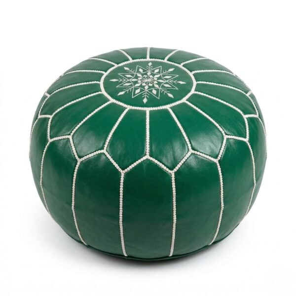 A premium green leather floor ottoman featuring a traditional star-shaped embroidery and white hand-stitched detailing on a solid white background.