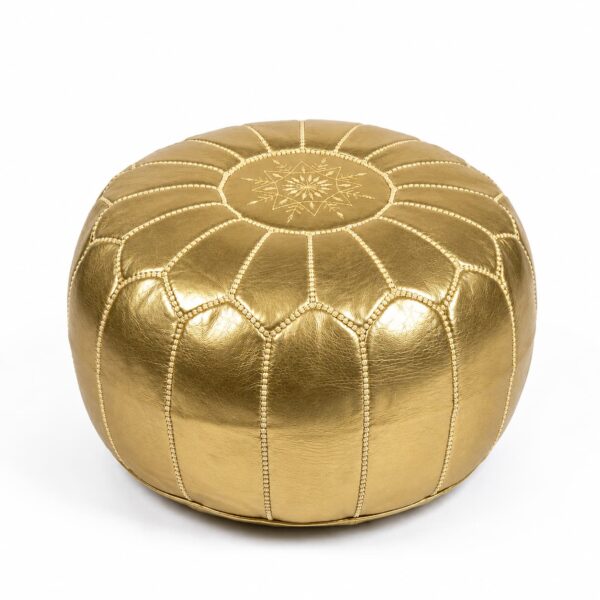 Gold leather round pouf isolated on a white background showing handcrafted Moroccan-inspired stitching and metallic gold leather finish.