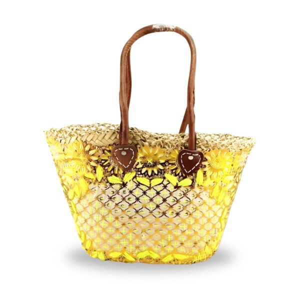 "Carry Moroccan sunshine wherever you go with this handwoven palm leaf tote featuring vibrant sunflower embroidery." - 99 chars ✓