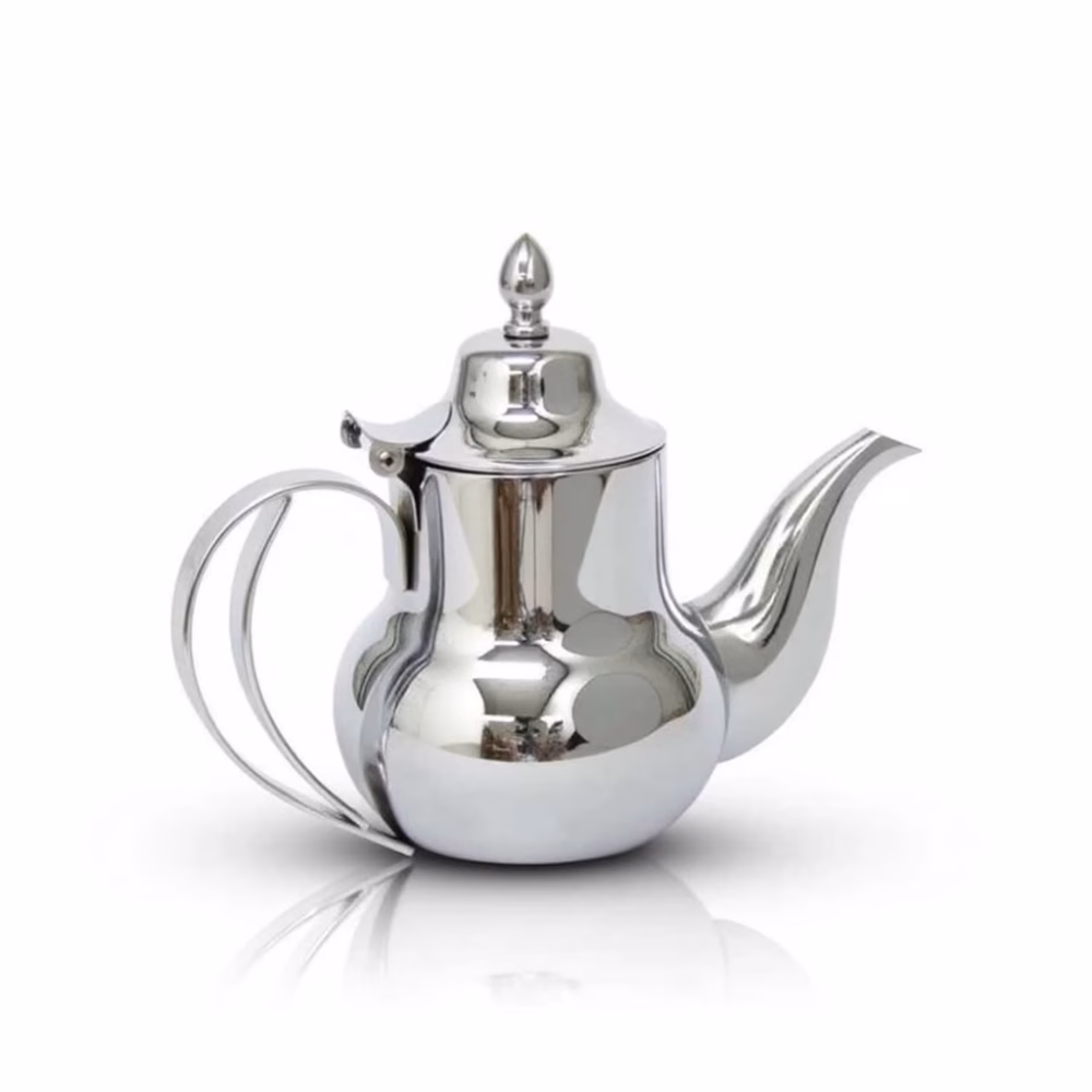 Professional grade stainless teapot on white background