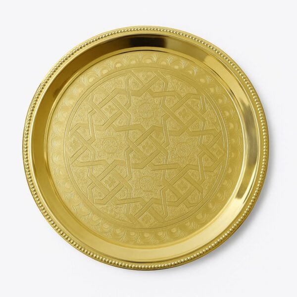 Hand-engraved eight-pointed star pattern on a mirror-polished round brass tray