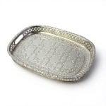 Silver-plated brass serving tray with geometric pattern and pierced gallery rim on white background