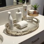 Embossed eight-pointed star motifs on silver-plated brass geometric serving tray with zellige pattern detail