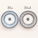 Side-by-side comparison of blue and black hand-painted Moroccan dinner plates