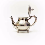 Open lid view of silver plated teapot