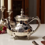 Traditional footed teapot in formal dining setting