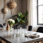 Moroccan tea glasses with black designs in dining setting