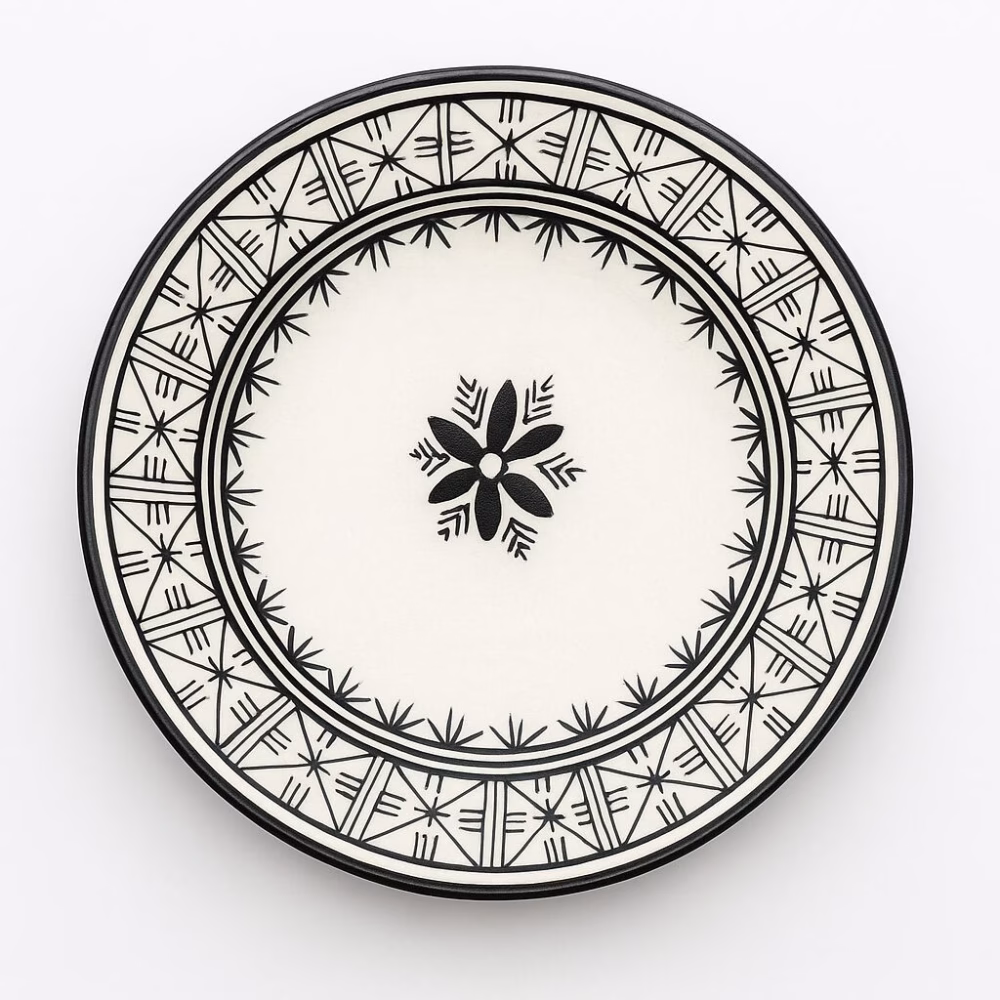 Top-view of hand-painted Moroccan black dinner plate with floral medallion, 24 cm diameter