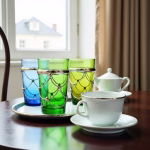 Traditional Moroccan tea glasses with teapot and table setting