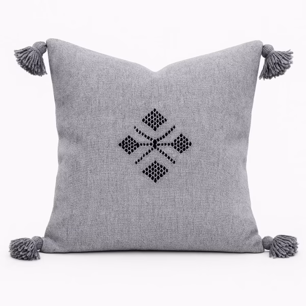Light gray Moroccan cushion with traditional embroidered pattern