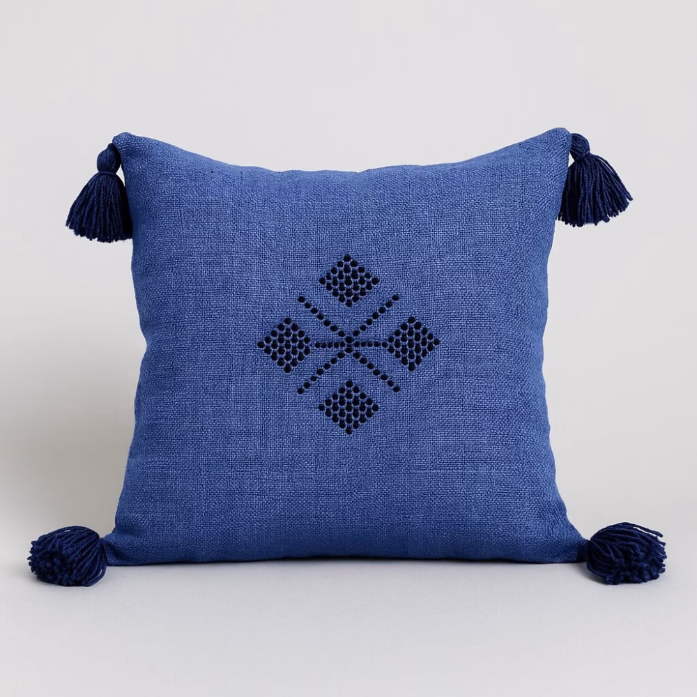 Royal blue Moroccan boho cushion with black embroidered pattern