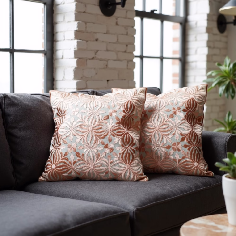Decorative pillow covers on gray sofa