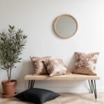 Floral embroidered cotton pillow covers set of 2 on wooden bench with modern home decor styling