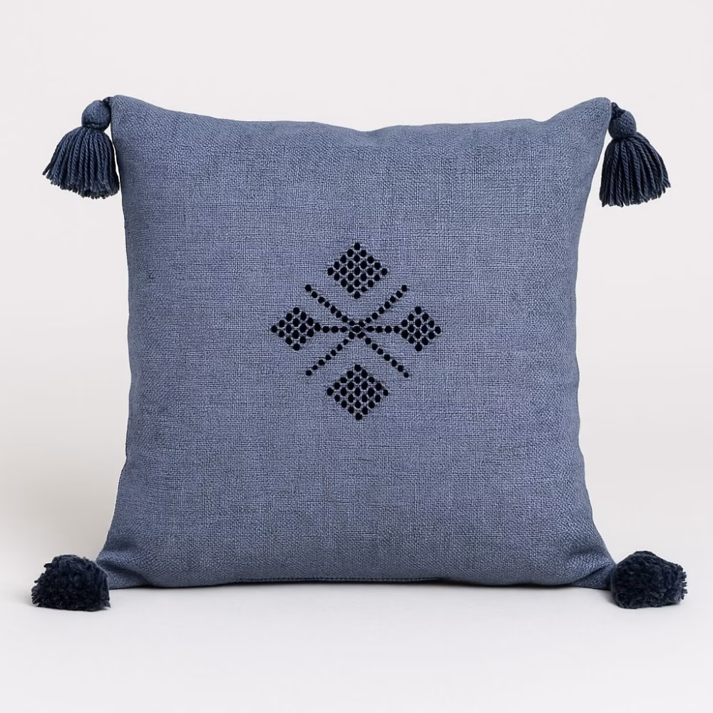 Sky blue Moroccan boho cushion with tassel details