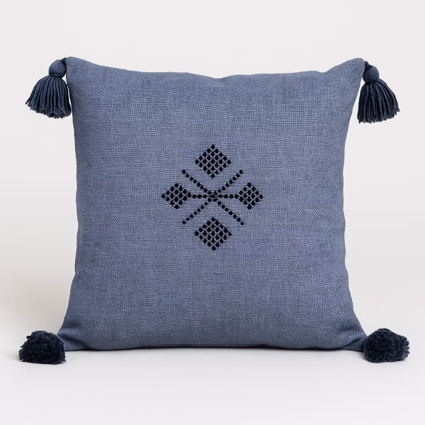 Sky blue Moroccan boho cushion with tassel details