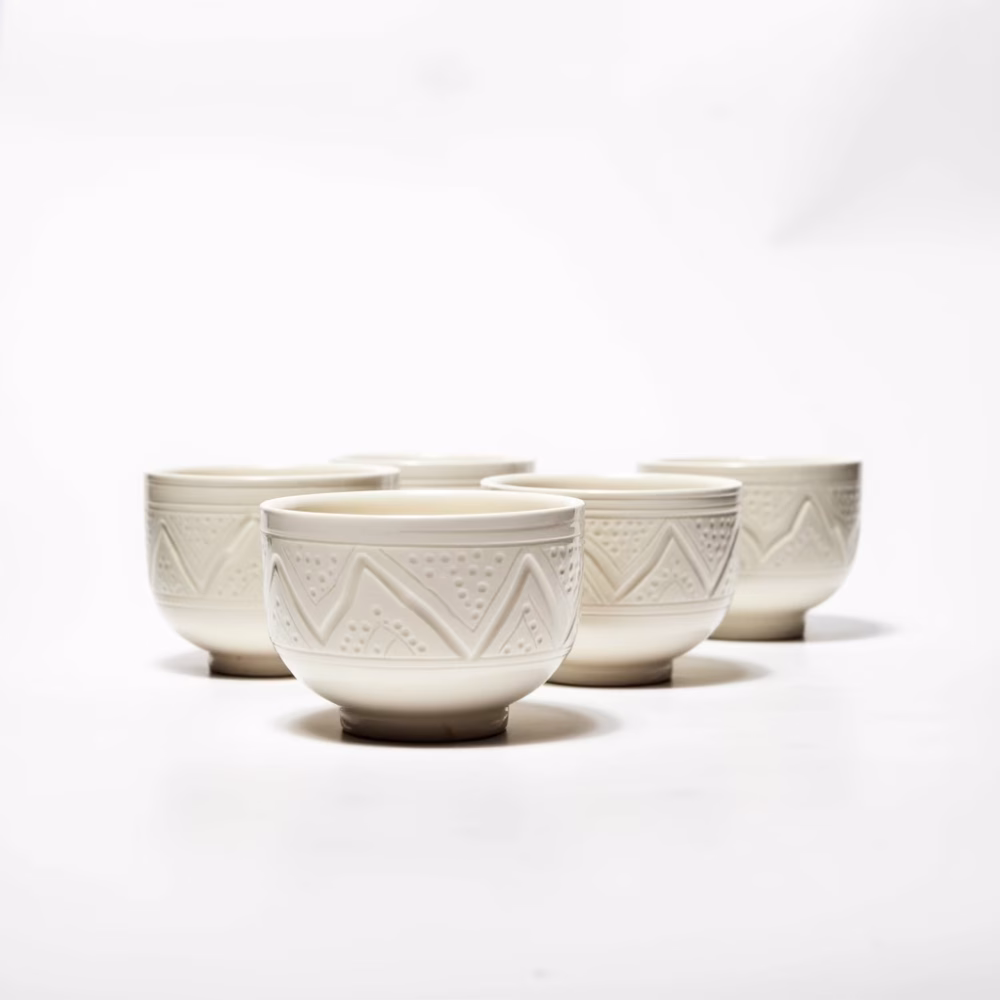 Premium ceramic bowl sets with geometric patterns shown in modern kitchens, restaurants and dining rooms