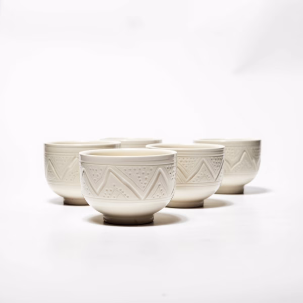 Premium ceramic bowl sets with geometric patterns shown in modern kitchens, restaurants and dining rooms