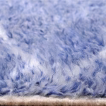 Close-up of soft wool texture on blue handcrafted farmhouse rug showing plush pile (2)