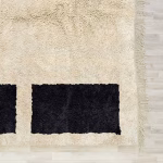 Contemporary Moroccan wool rug featuring black rectangle accent