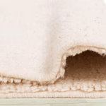 Detail view of handcrafted Moroccan rug showing the quality backing and natural fibers