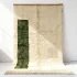 Handwoven Moroccan boheme rug in natural cream with vertical green accent stripe and textured wool pile