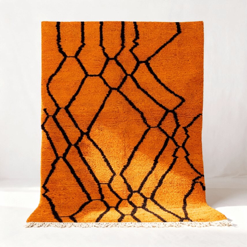 Orange geometric Moroccan rug with black diamond lattice pattern - MCWR11 (Featured Back) Orange geometric Moroccan rug with bold black diamond lattice pattern and white fringe displayed in full view