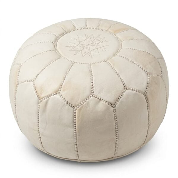 Handcrafted undyed genuine leather pouf in natural tan with embroidered geometric star motif on white studio background