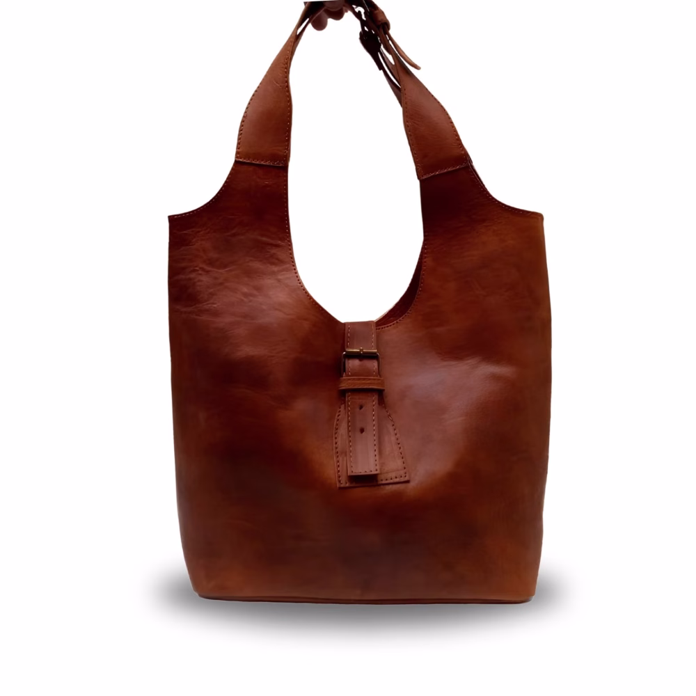 Front view of sleek brown leather shoulder bag with modern design