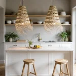 Three handwoven straw pendant lights clustered in dining room with black chairs and natural wood table
